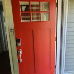 red front door by DCD Construction