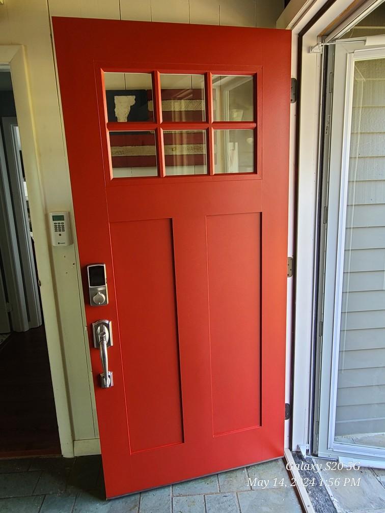 red front door by DCD Construction